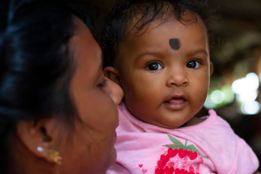 woman holding a baby